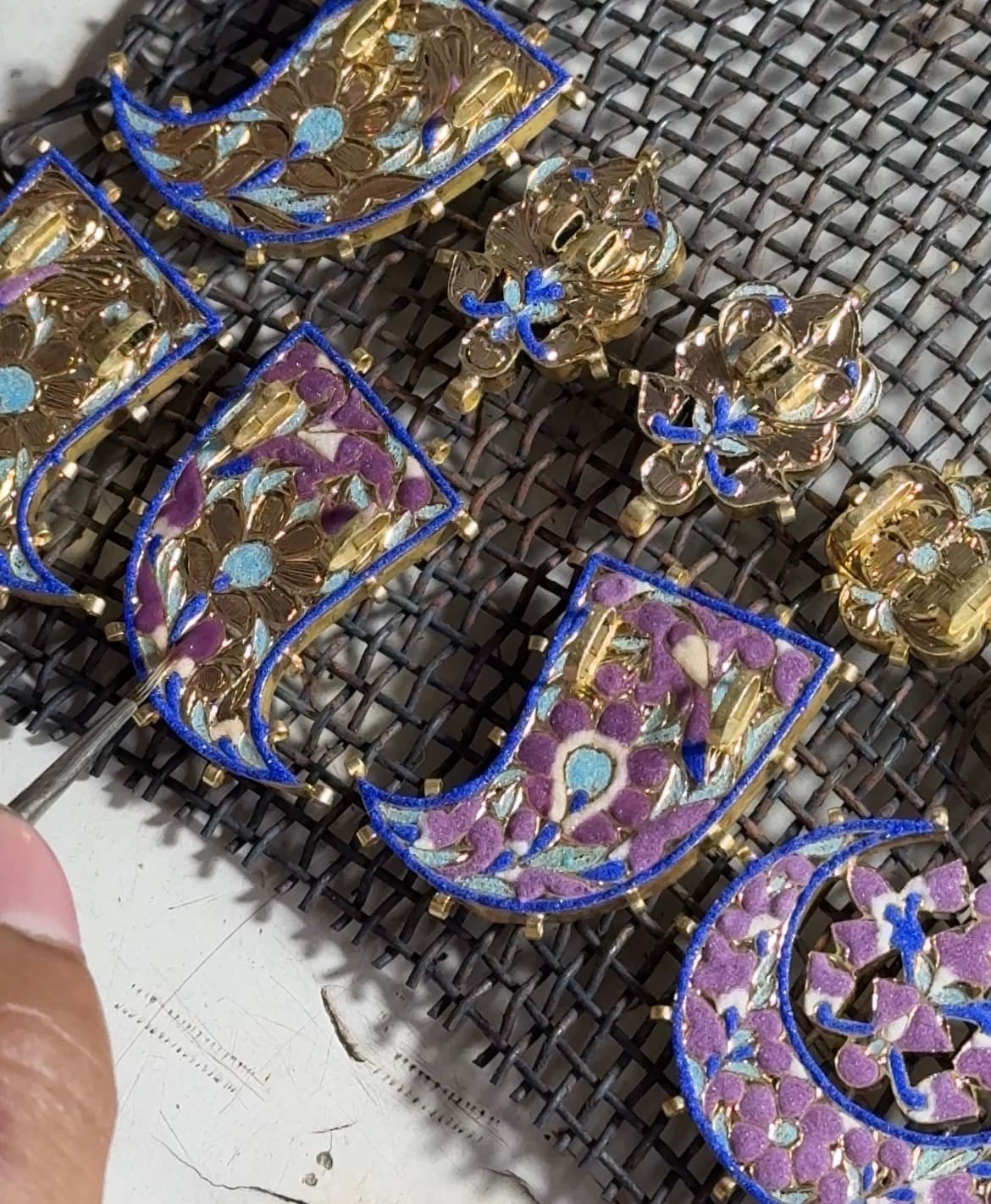 Meenakari detail — traditional Rajasthani enamel artistry on gold